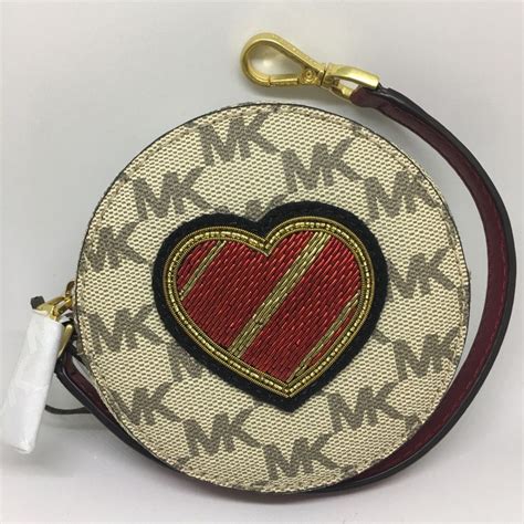 michael kors tan coin purse|Michael Kors beige purse.